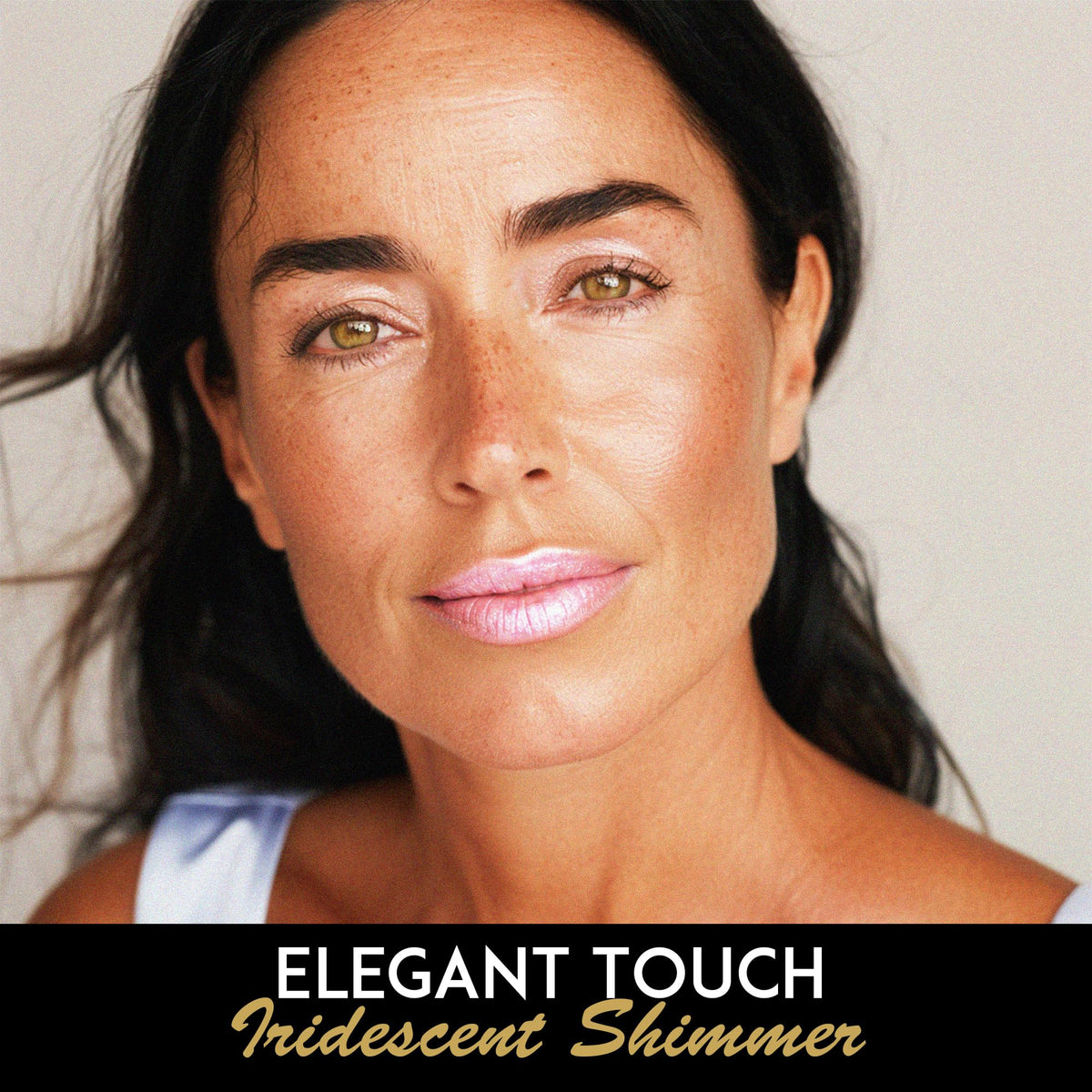 L'Paige L44 swatch on hand showing buildable shimmer and cool undertone