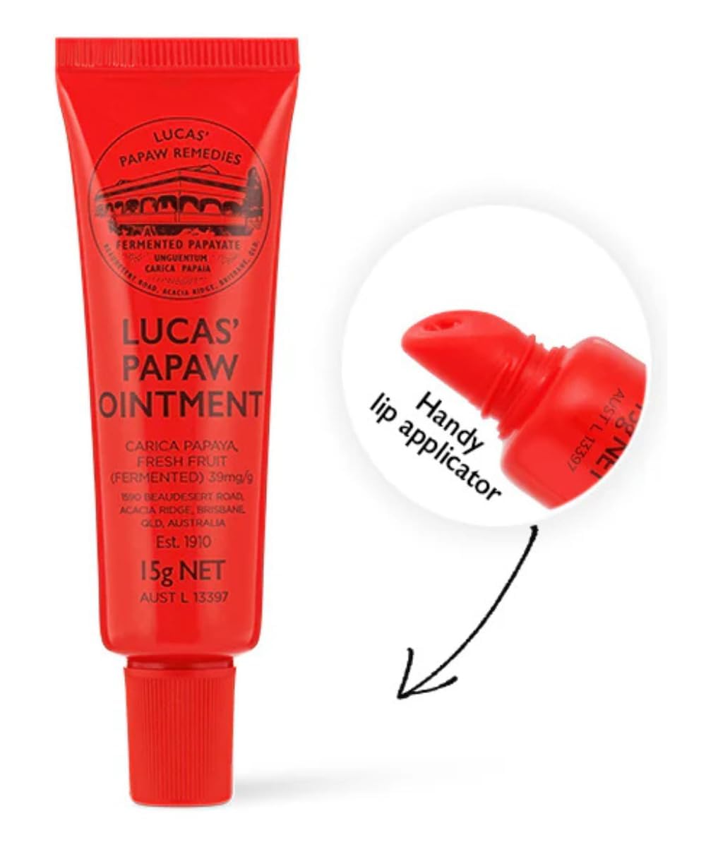Lucas Papaw tube beside phone and keys showing pocket-size convenience