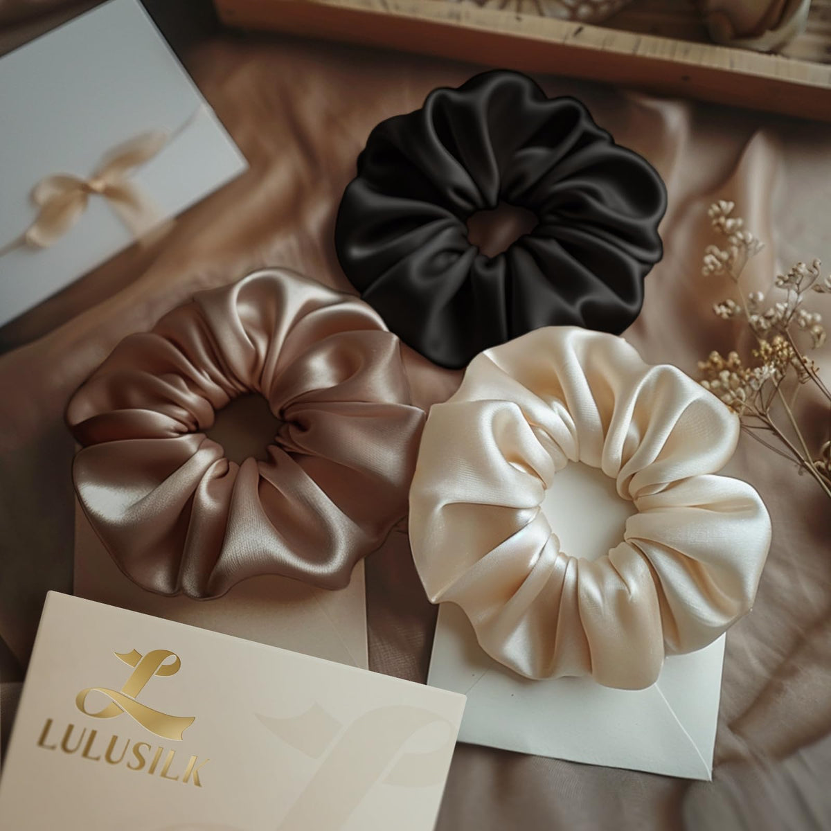 LULUSILK scrunchie on bedside table illustrating sleep-friendly hair protection