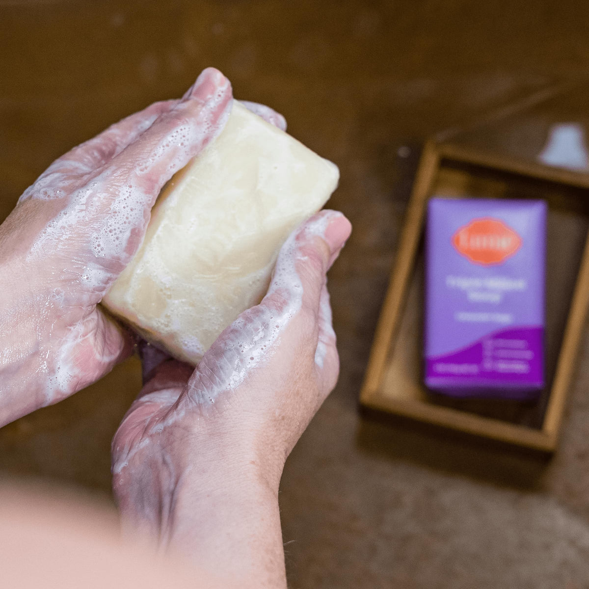 Applying Lume stick underarm for long lasting odor control