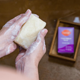 Applying Lume stick underarm for long lasting odor control