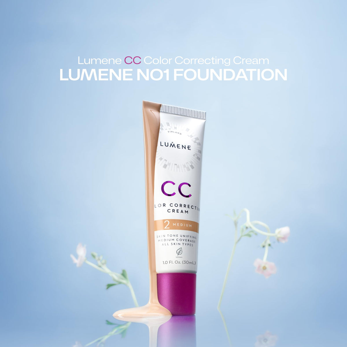 Fingers applying Lumene CC cream demonstrating quick, blendable coverage