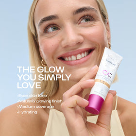 Lumene bottle beside lingonberry highlighting antioxidant ingredient