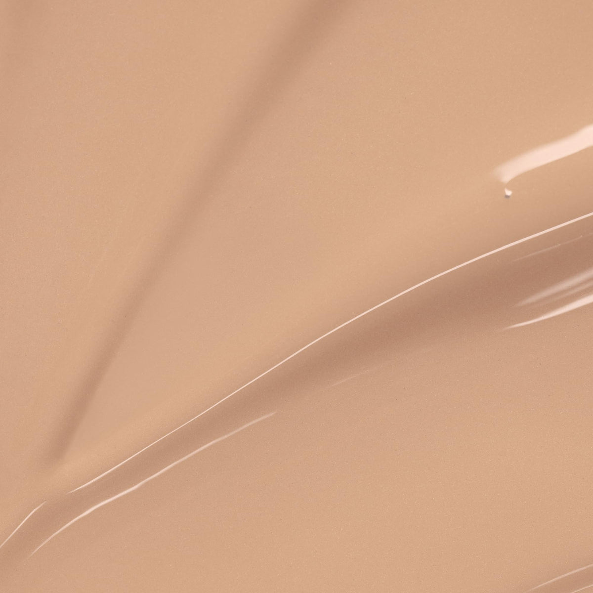Close-up texture swirl of Lumene CC cream highlighting smooth blendability
