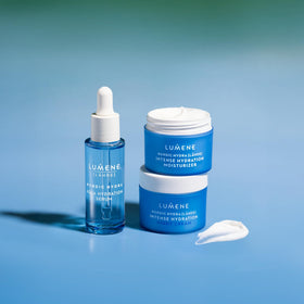 Lumene jar on bathroom shelf in bright natural light suggesting daily routine and eco-conscious beauty