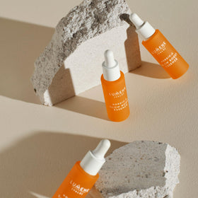 Lumene bottle on bathroom vanity styled for daily morning routine