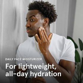 Lumin bottle next to shaving essentials showing compatibility with daily grooming routine