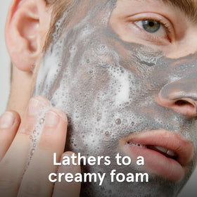Lumin foam texture of charcoal facial wash demonstrating gentle lather and effective cleansing