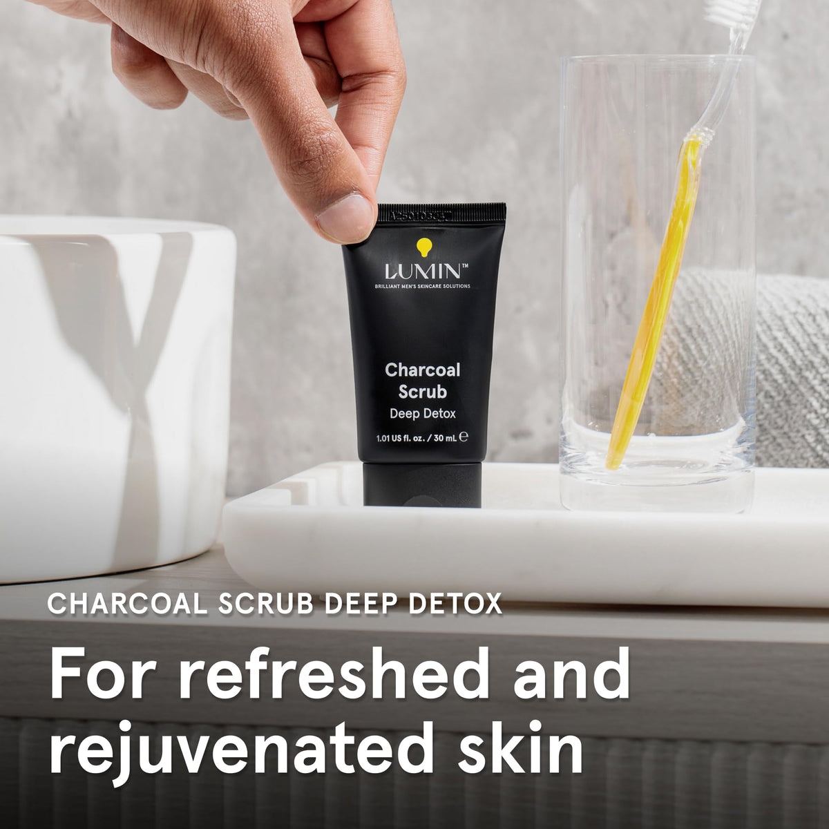 Lumin charcoal scrub results on jawline showing smoother skin after exfoliation