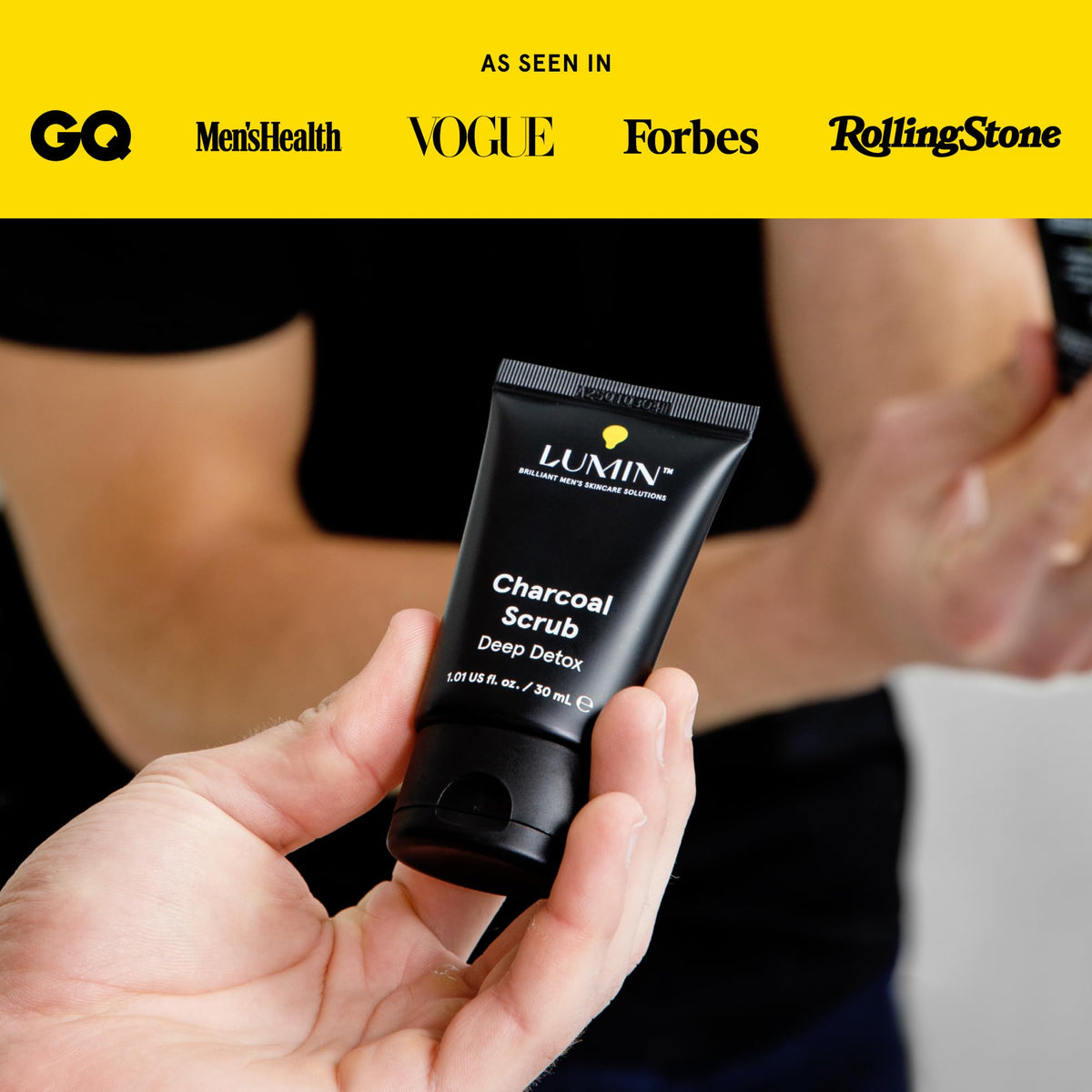 Lumin charcoal scrub placed on bathroom shelf for an easy morning skincare routine