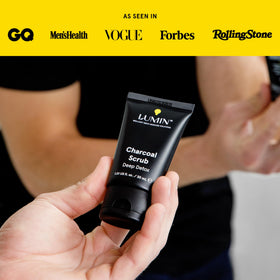 Lumin charcoal scrub placed on bathroom shelf for an easy morning skincare routine