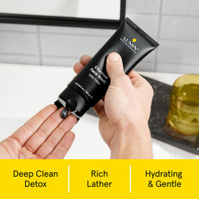 Lumin charcoal face wash texture close-up highlighting gentle exfoliation benefit