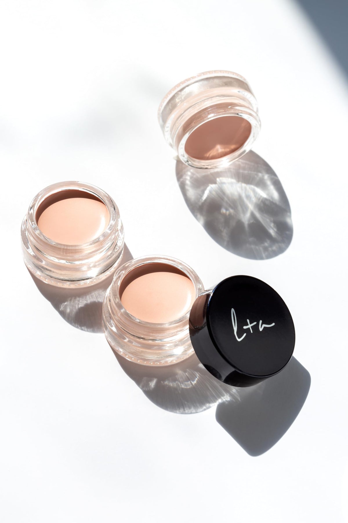 Lune+Aster on bathroom vanity in lifestyle scene showing everyday skincare routine