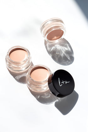 Lune+Aster on bathroom vanity in lifestyle scene showing everyday skincare routine