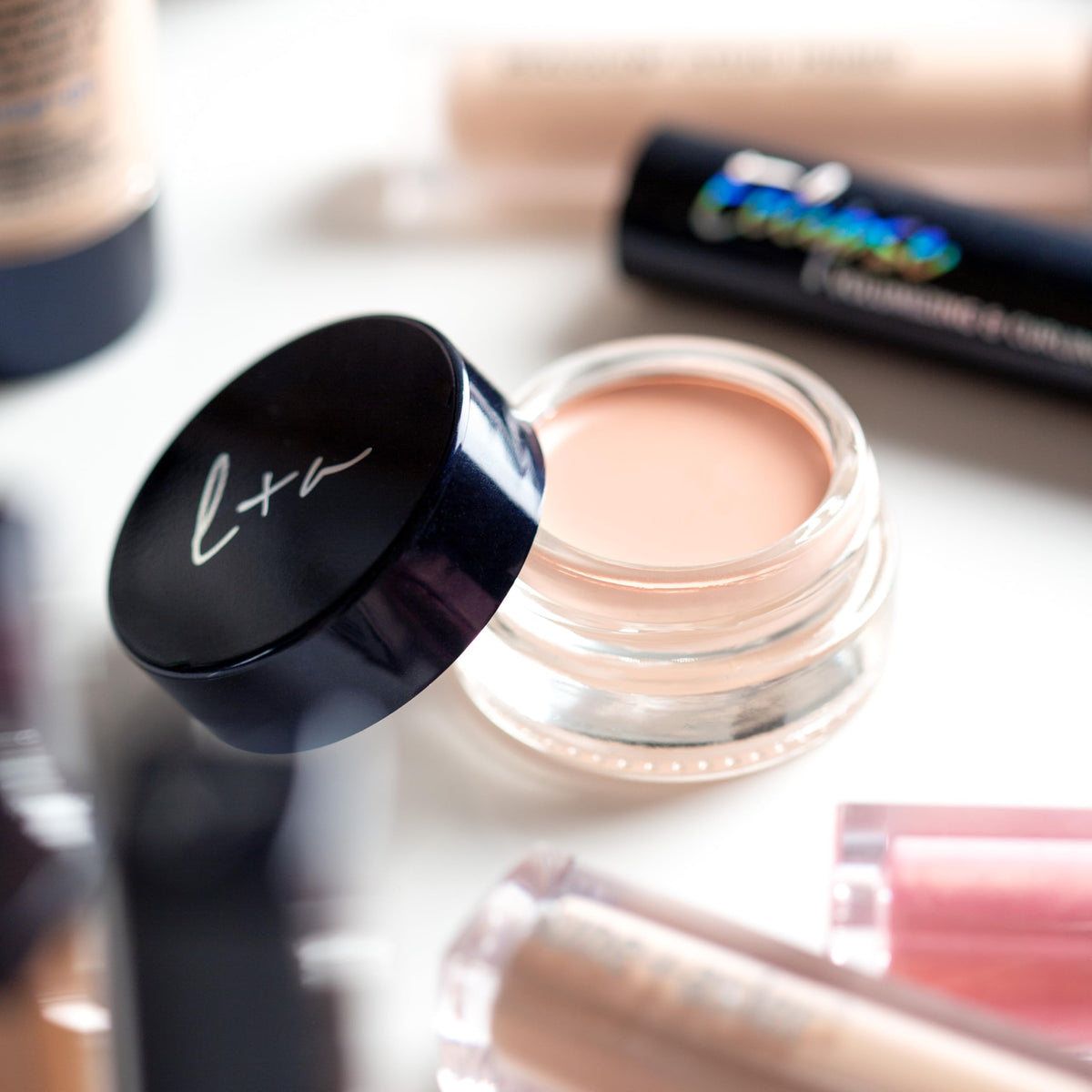 Lune+Aster packaging label close-up showing clean-beauty claims and ingredient highlights