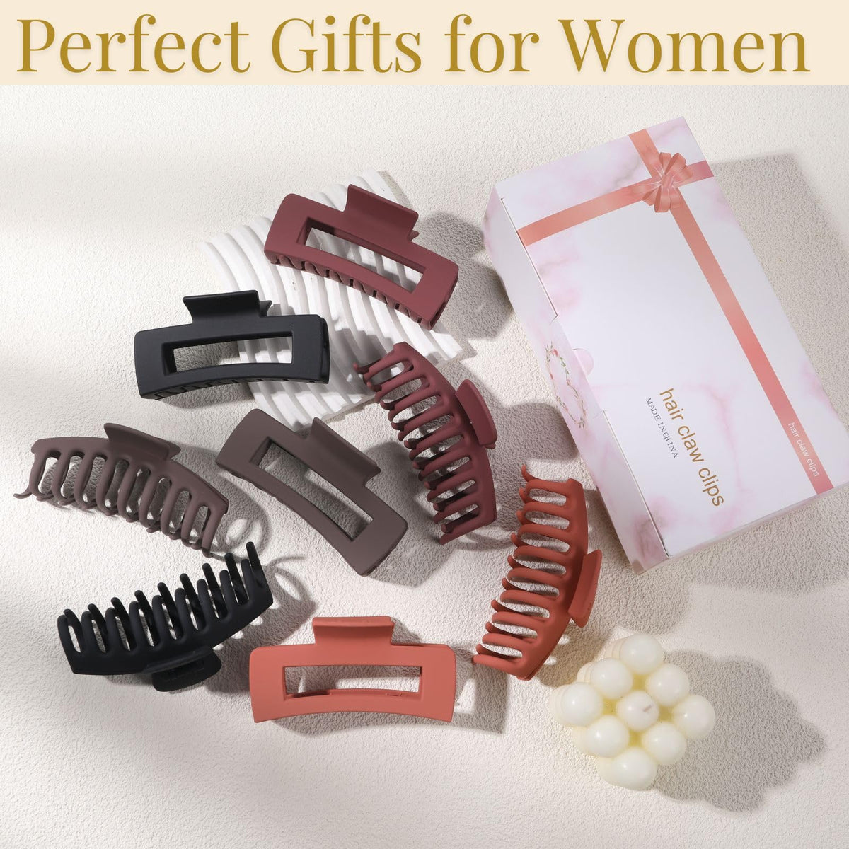 LuSeren clip held in hand to show 4.3-inch scale and lightweight comfort
