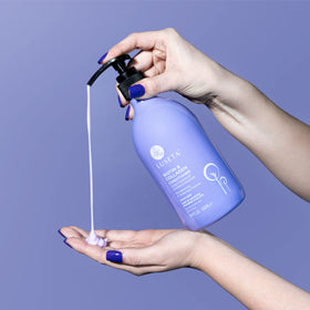 Luseta conditioner being applied in shower for detangling and softness