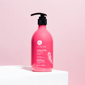 LUSĒTA shampoo in use foaming on wet hair to reduce frizz and improve manageability