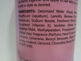 Luster's pink in use detangling hair demonstrating improved manageability and softness