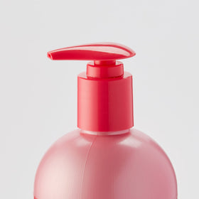 Luster's pink oil moisturizer creamy pour texture highlighting easy spread