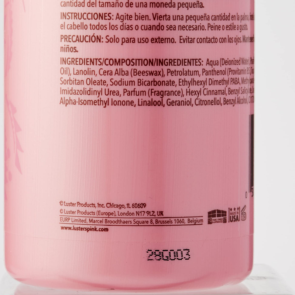Luster's pink oil moisturizer large 32 oz bottle next to smaller bottle for scale