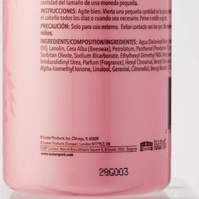 Luster's pink oil moisturizer large 32 oz bottle next to smaller bottle for scale