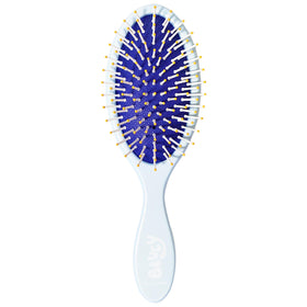 LUV HER brush in child's hand demonstrating gentle brushing benefit