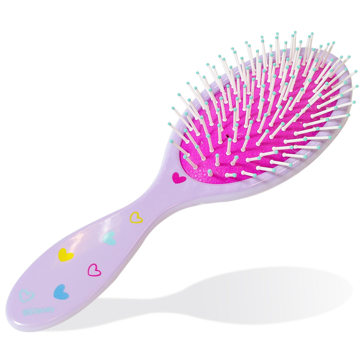 LUV HER brush held in a child’s hand to show size and easy handling benefit