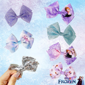 LUV HER hair accessories arranged in a bedroom scene inspiring everyday dress-up fun
