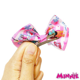 LUV HER bow worn in a girl's hair showing secure, playful styling