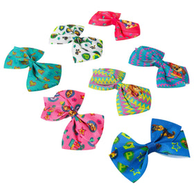 LUV HER child wearing multiple bows in outdoor setting, fun everyday styling