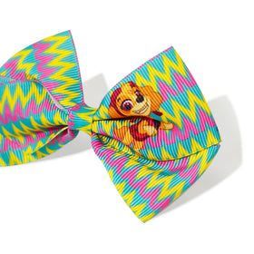 LUV HER 4-inch bow next to ruler for scale, demonstrates true size