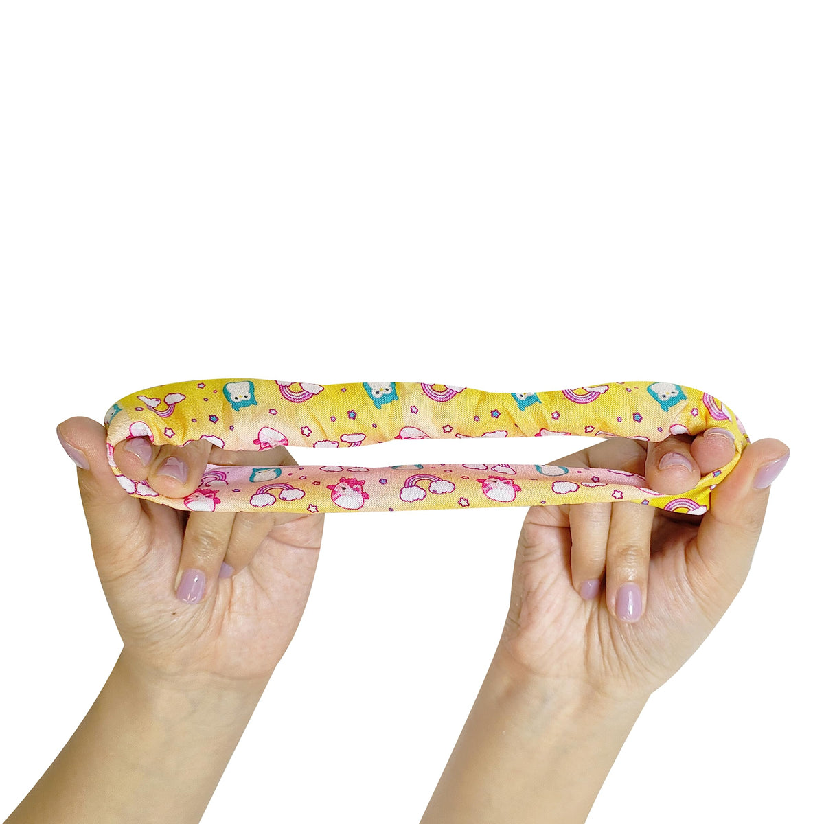 LUV HER scrunchie next to a hand showing large size and easy-to-grab scale