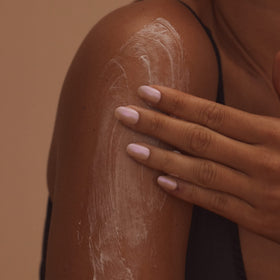 + Lux Unfiltered bottle beside self-tanner to show tan-friendly pairing benefit