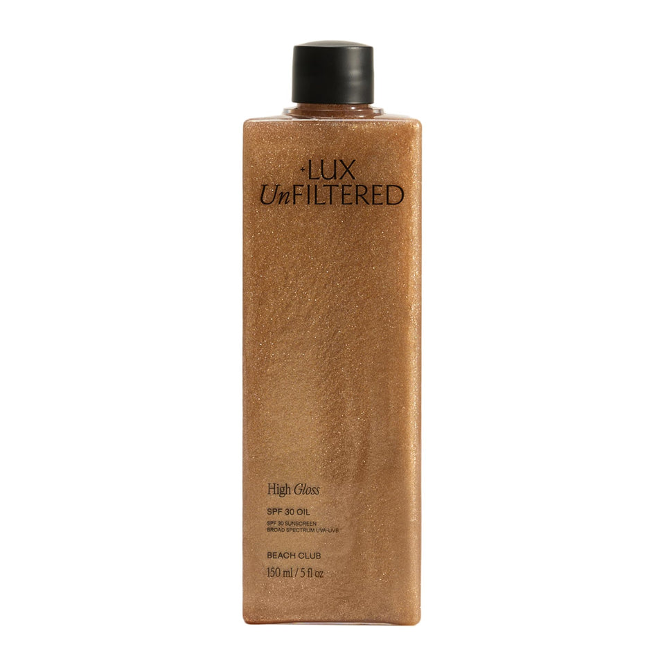 Lux Unfiltered front bottle view showing bronzed oil and glossy finish benefit