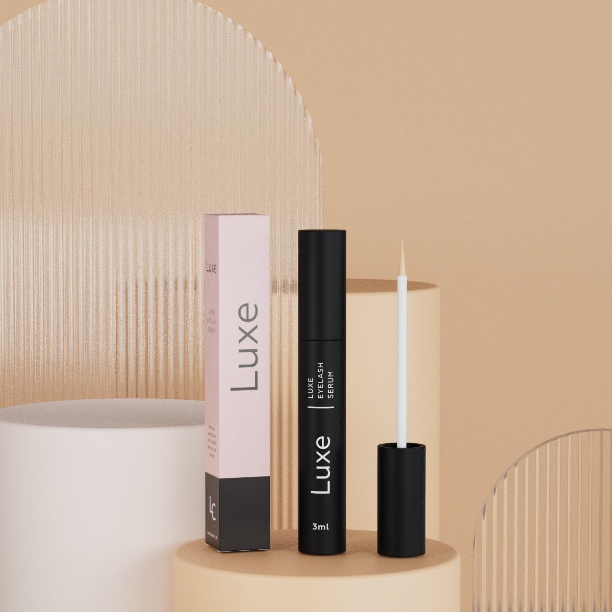 LUXE demonstration applying serum to upper lash line for growth support