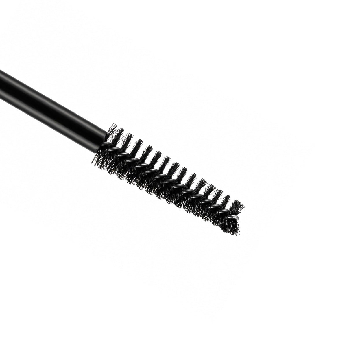 LUXÉ mascara applied on model lashes in lifestyle scene demonstrating length, volume, and wear