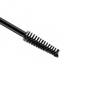LUXÉ mascara applied on model lashes in lifestyle scene demonstrating length, volume, and wear