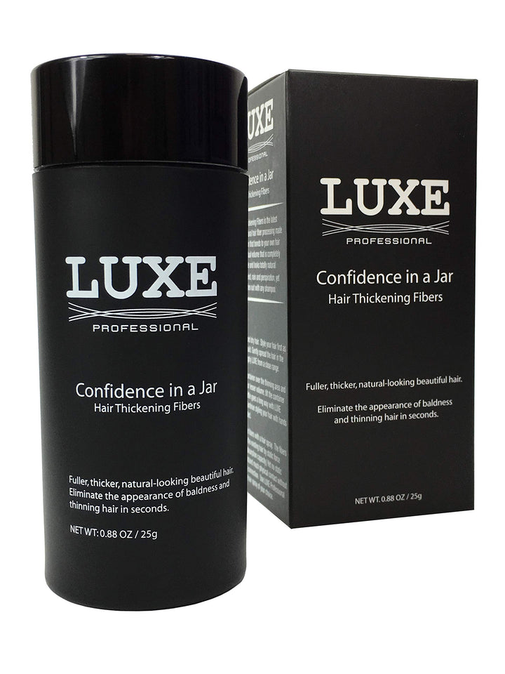 LUXE Professional jar front view showing dark brown fibers and compact packaging benefit