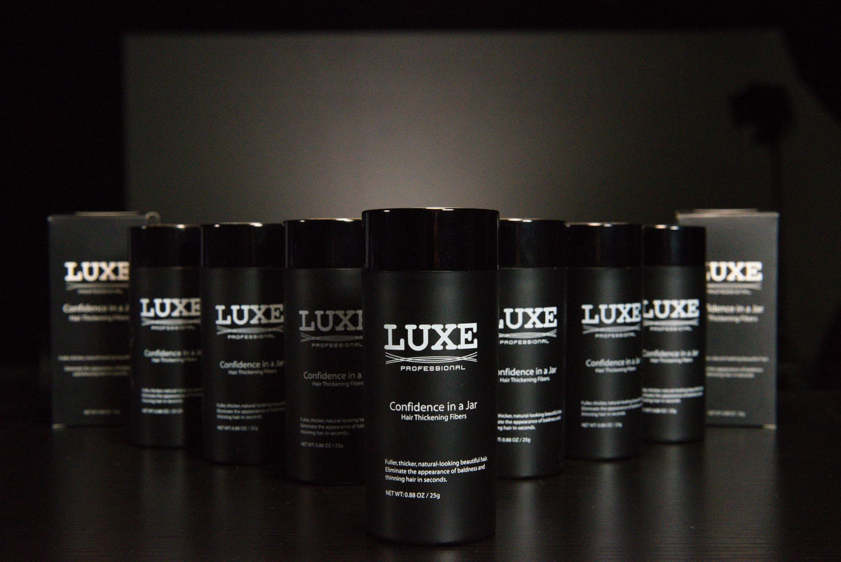 LUXE Professional jar in travel pouch showing portability and on-the-go touch-up benefit