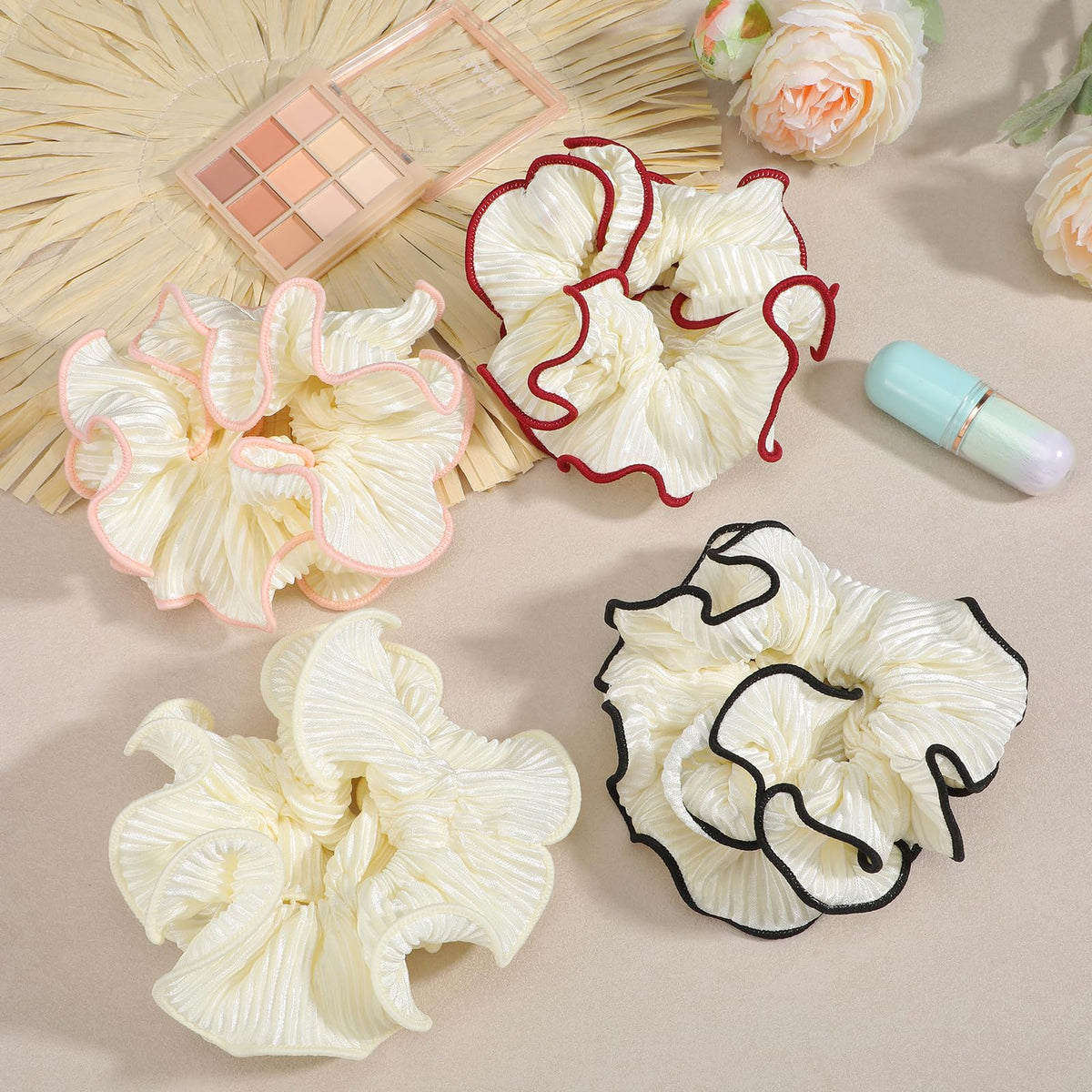 LXUEJIE four scrunchies laid flat showing color variety and elegant finish