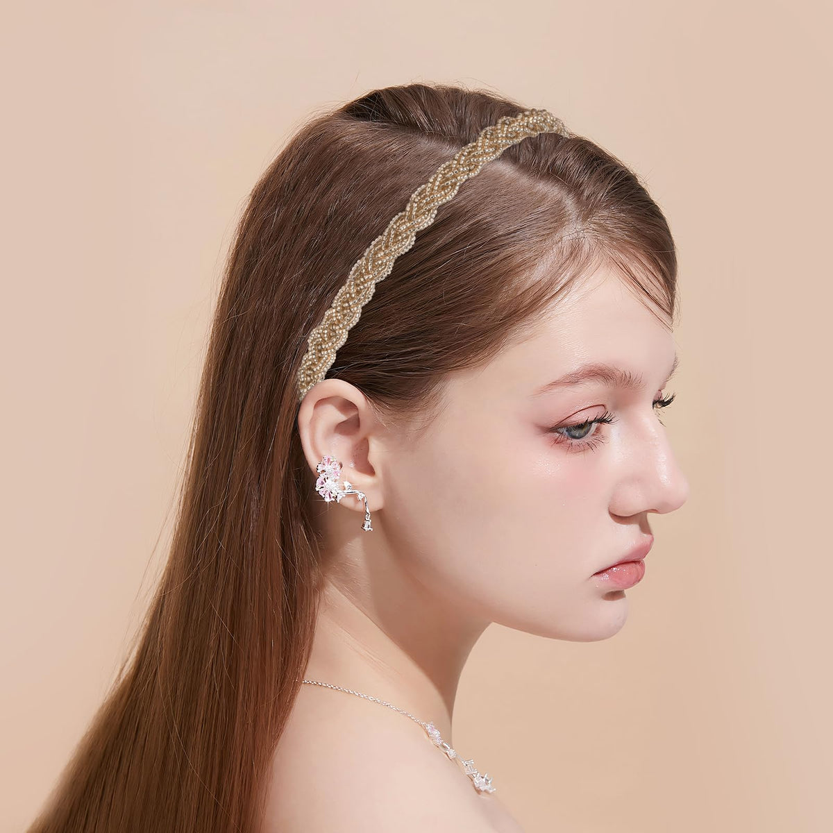 LYroo headbands beside a hand showing scale for true fit