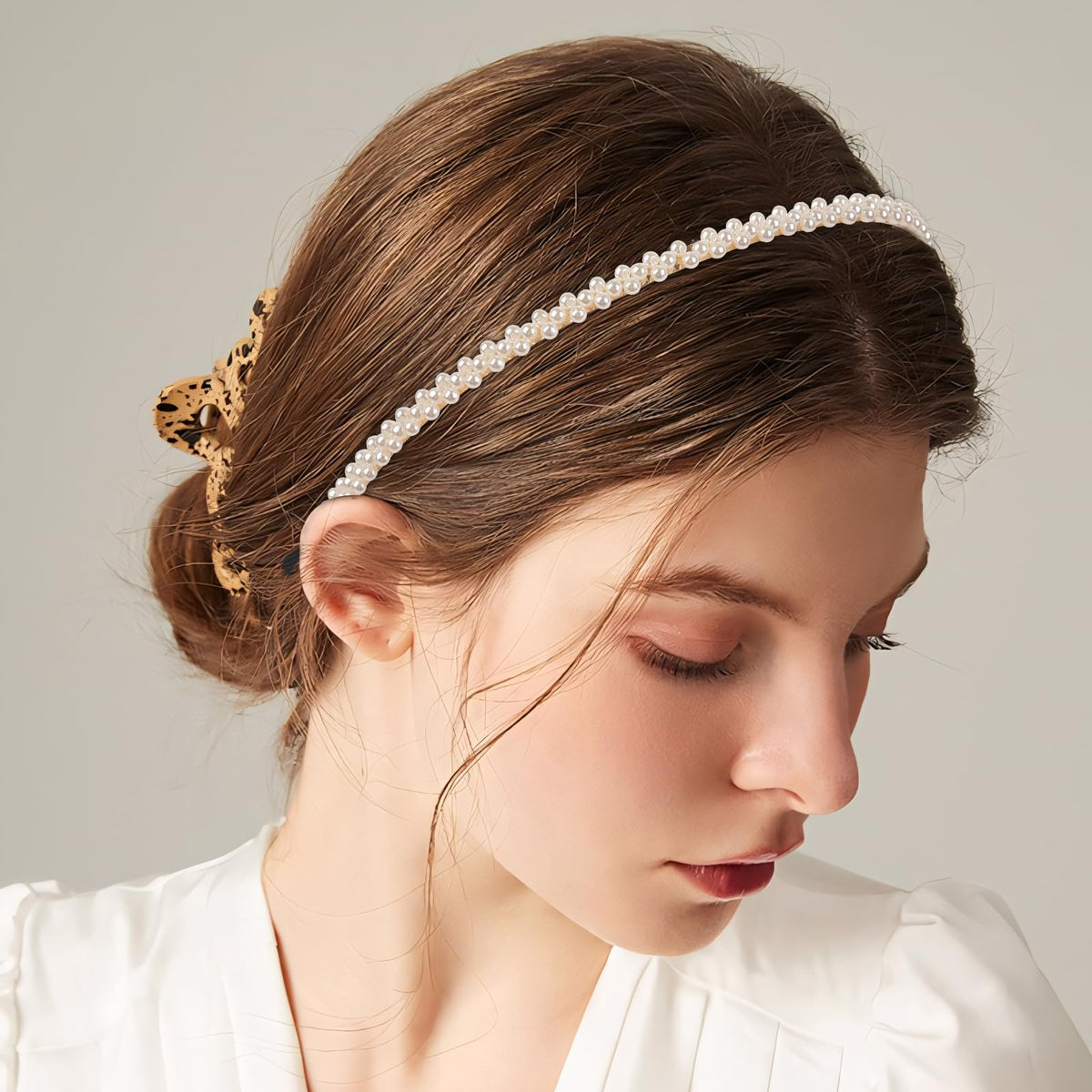 LYroo headband worn with an updo demonstrating easy styling