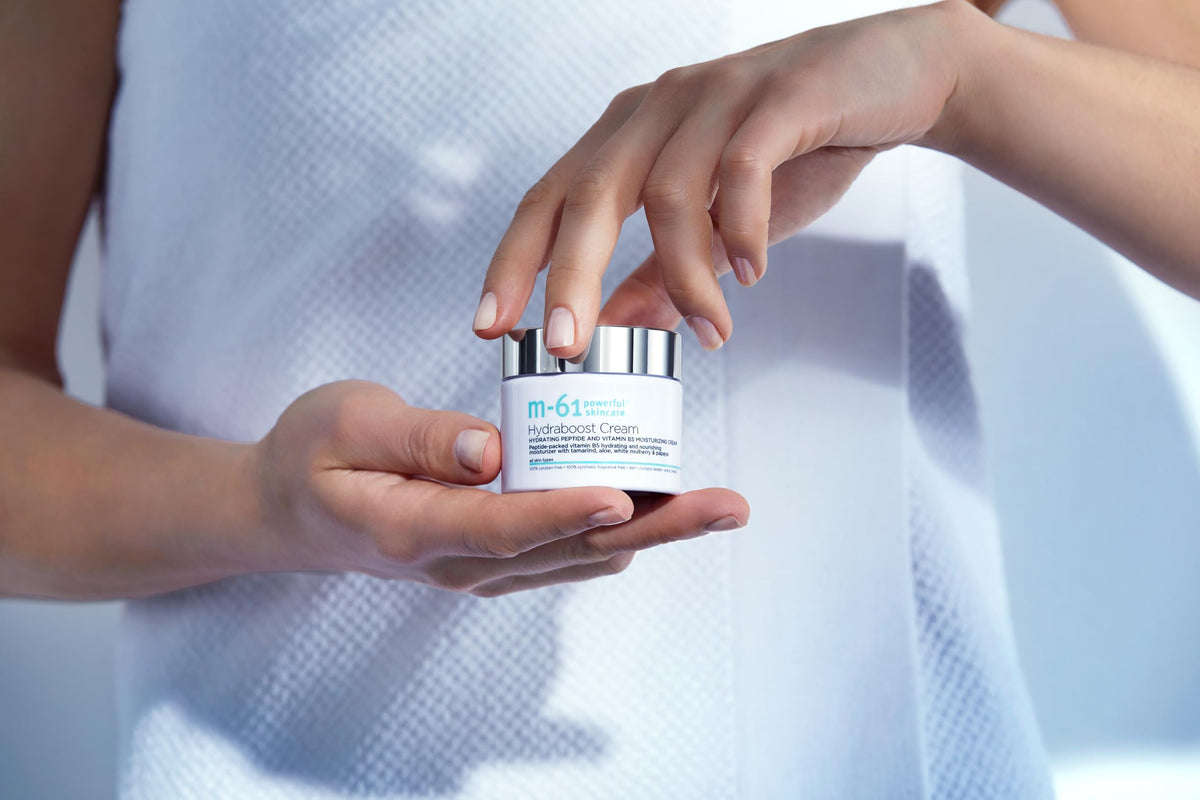 m-61 Hydraboost next to ruler showing 1.7 fl oz scale benefit