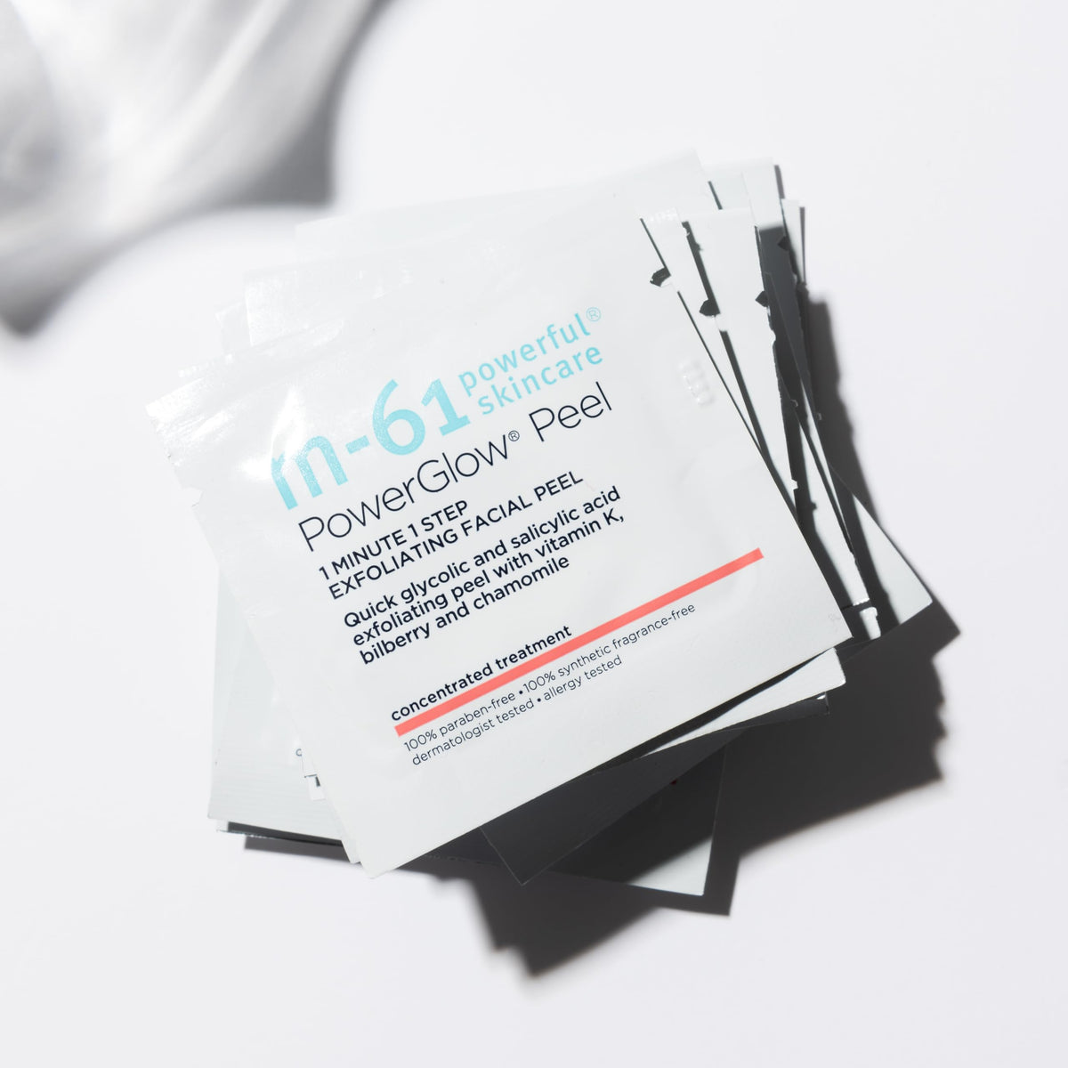 m-61 single peel pad held in hand demonstrating quick one-minute, one-step use