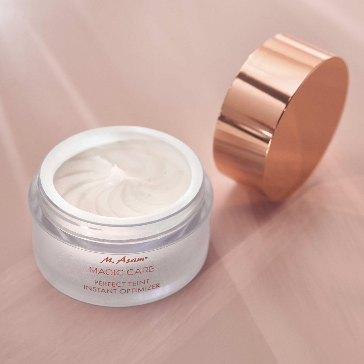 M. Asam product in use applied to cheek demonstrating mattifying, pore-blurring benefit