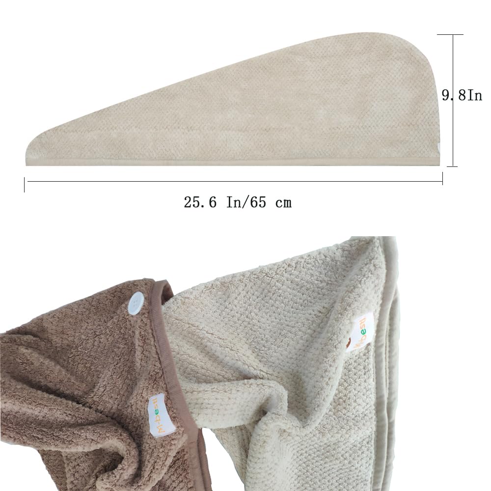 M-bestl towels styled on a stool in spa-like scene, easy-care and attractive