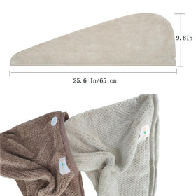 M-bestl towels styled on a stool in spa-like scene, easy-care and attractive
