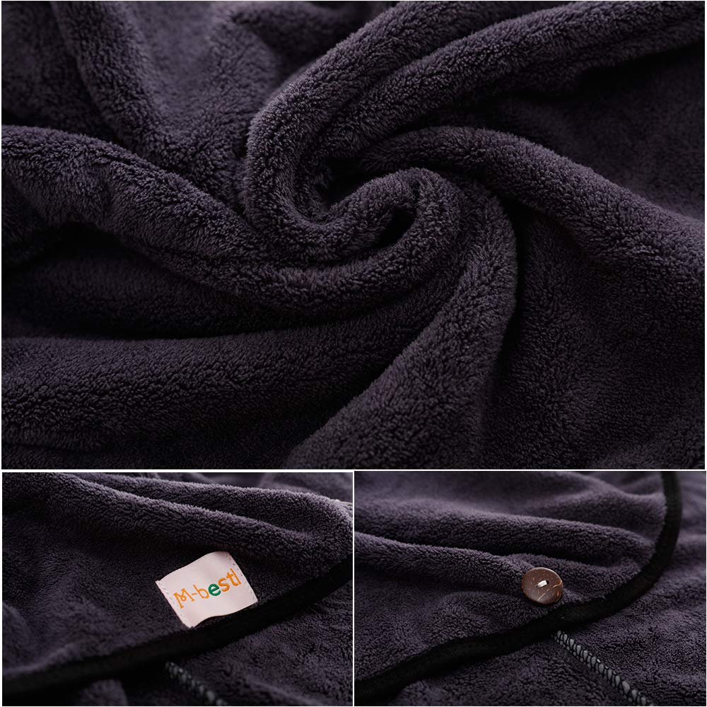 M-bestl towel next to a hand and ruler, 25x65 cm size visualization