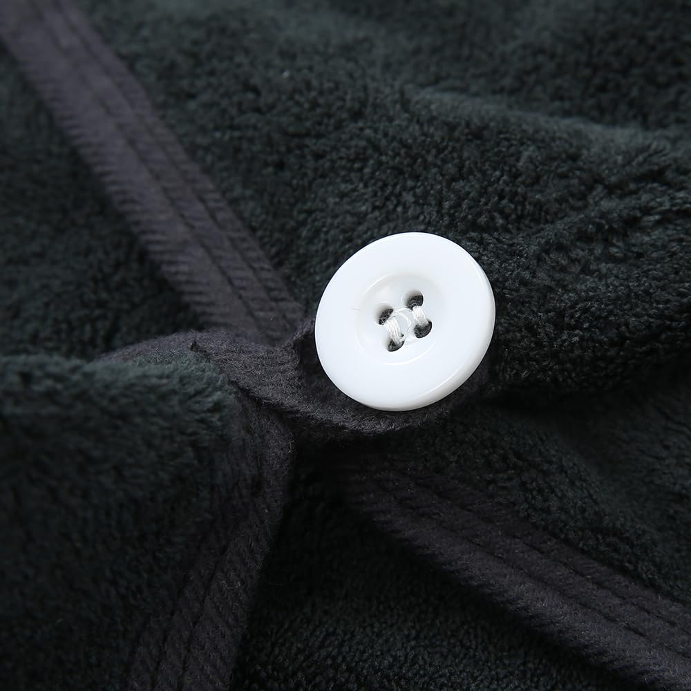 M-bestl towel beside hand for scale showing 25x65 cm size and suitability for long hair
